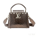 Louis Vuitton Capucines Metallic Python / Alligator