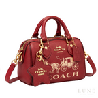 Coach Bag | Mini Rowan Crossbody Bag (featuring a prominent horse & carriage motif and matching star logo charm) – Crimson Red – Cherry (Pebbled leather with gold-tone hardware)