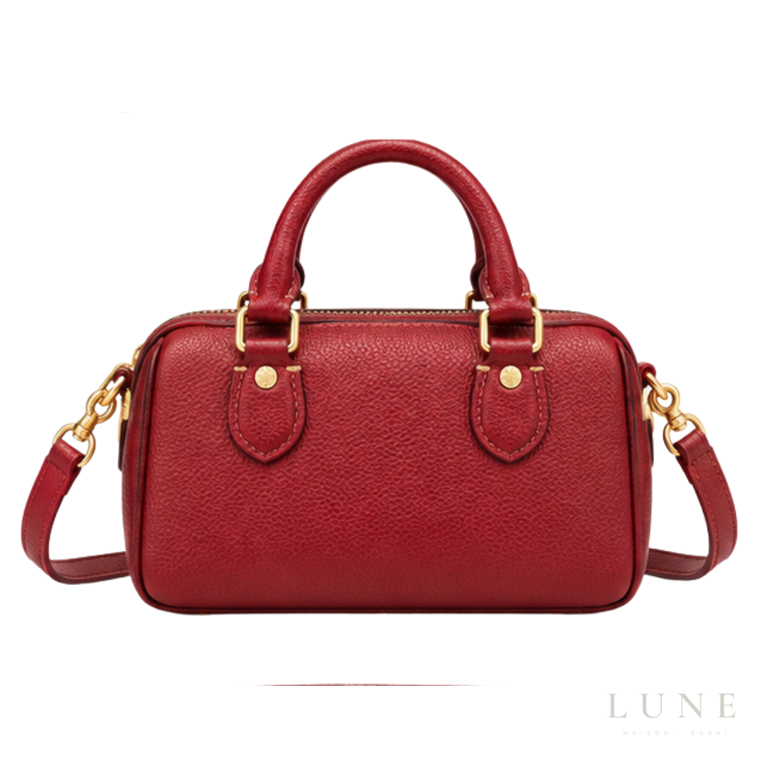 Coach Bag | Mini Rowan Crossbody Bag (featuring a prominent horse & carriage motif and matching star logo charm) – Crimson Red – Cherry (Pebbled leather with gold-tone hardware)