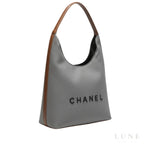 Chanel Deauville Canvas Tote Bag with Brown Leather