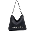 Chanel Hobo Shoulder Bag with A Ribbed Texture and Silver Chain Straps