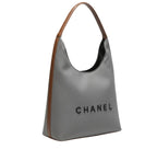 Chanel Deauville Canvas Tote Bag with Brown Leather