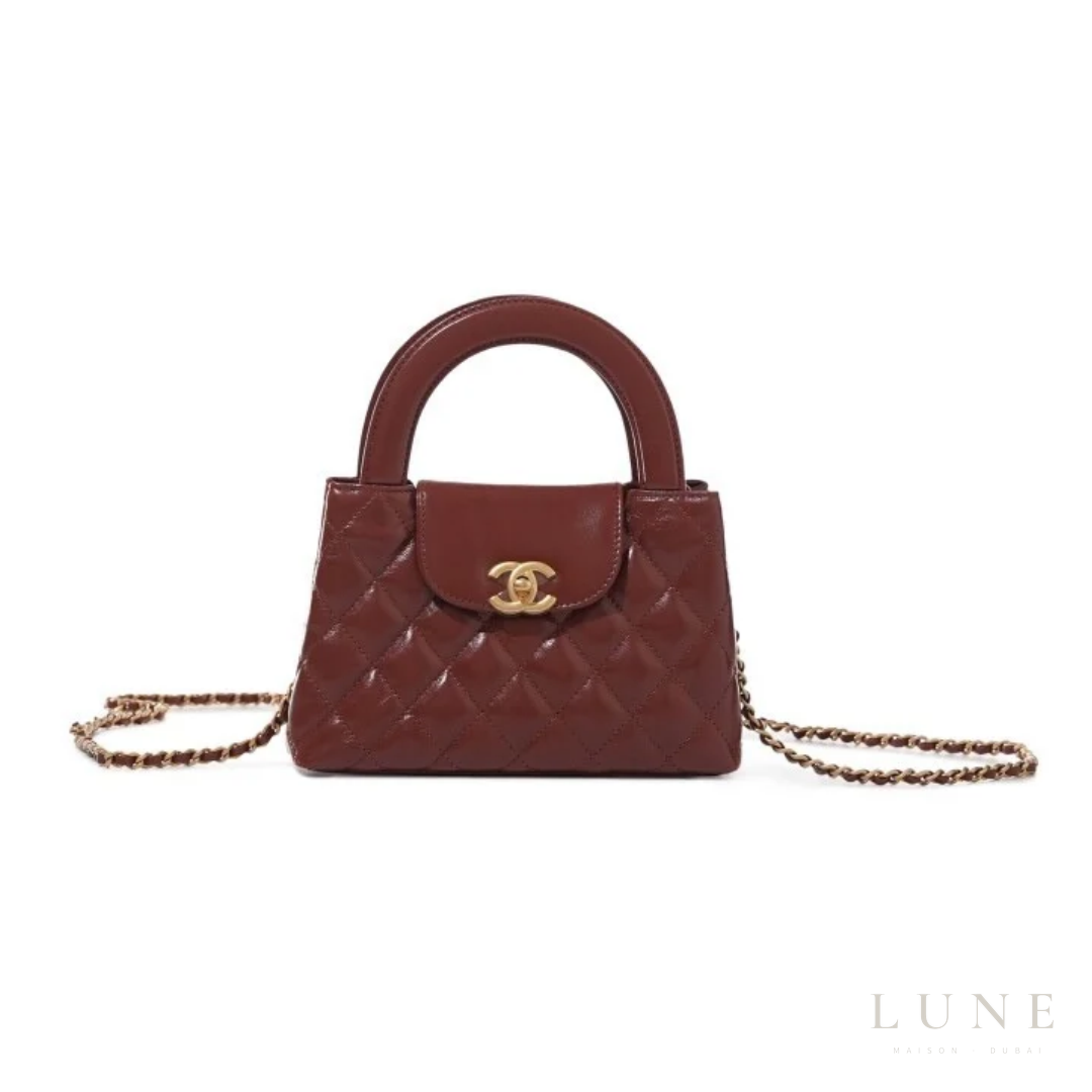 Chanel | Brown Quilted Aged Calfskin Mini Kelly Brushed Gold Hardware - View 1