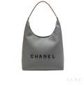 Chanel Deauville Canvas Tote Bag with Brown Leather