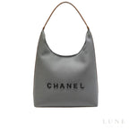 Chanel Deauville Canvas Tote Bag with Brown Leather